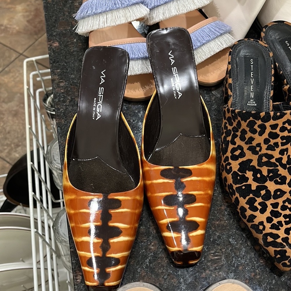 Make a simply out fit pop with these designer mules!